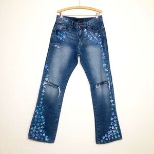 Calvin Klein distressed boot, cut hand painted jeans